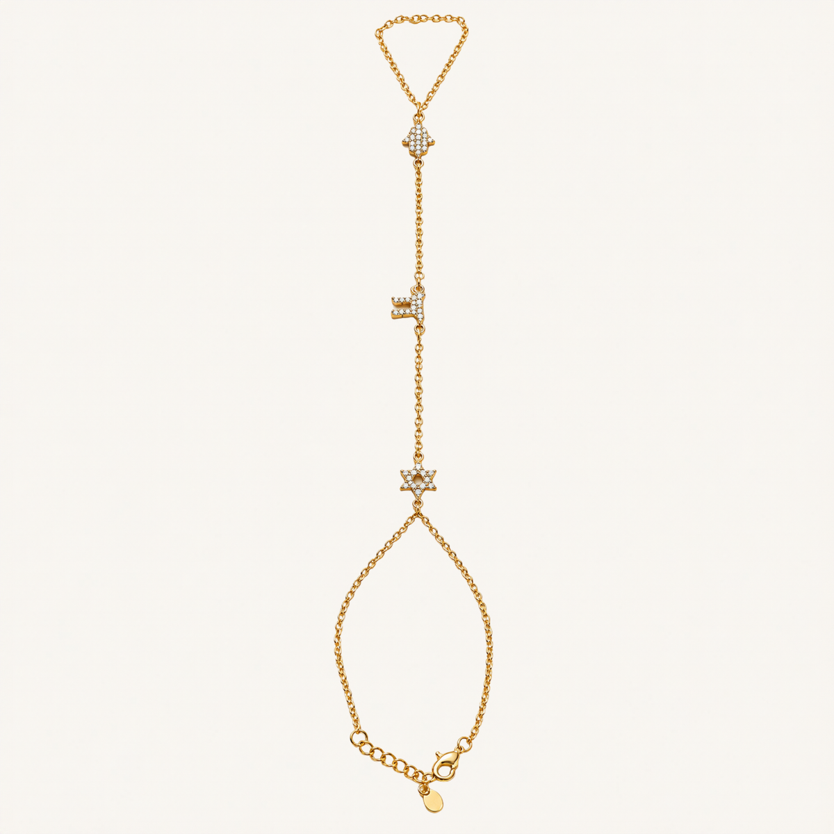 Gold-tone hand chain with Hamsa, Chai and Star of David charms.