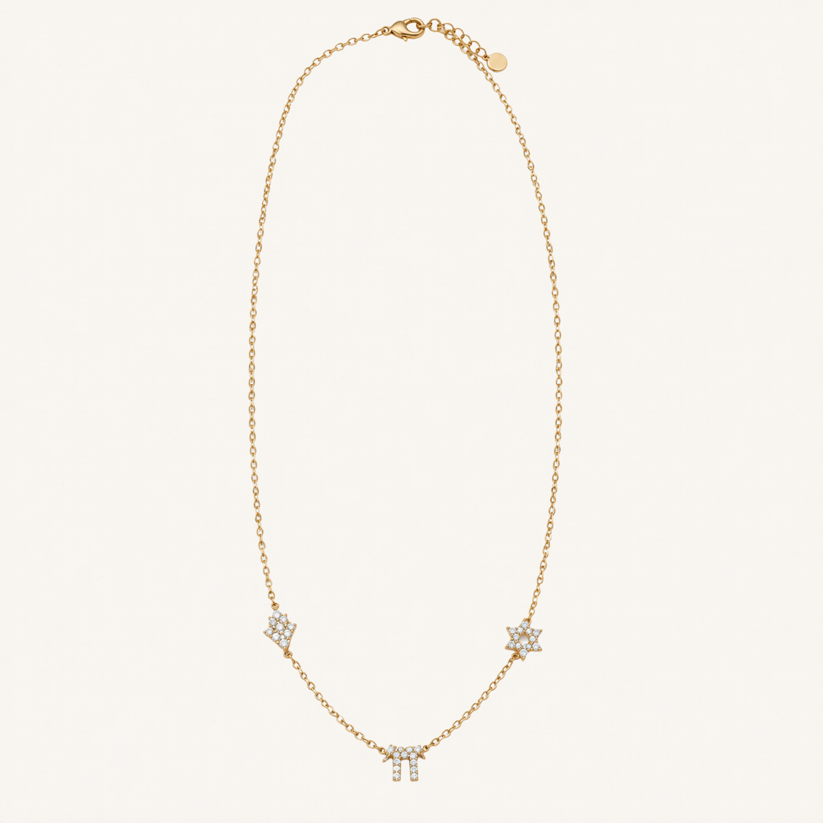 Gold-tone chain necklace with Hamsa, Chai and Star of David charms.