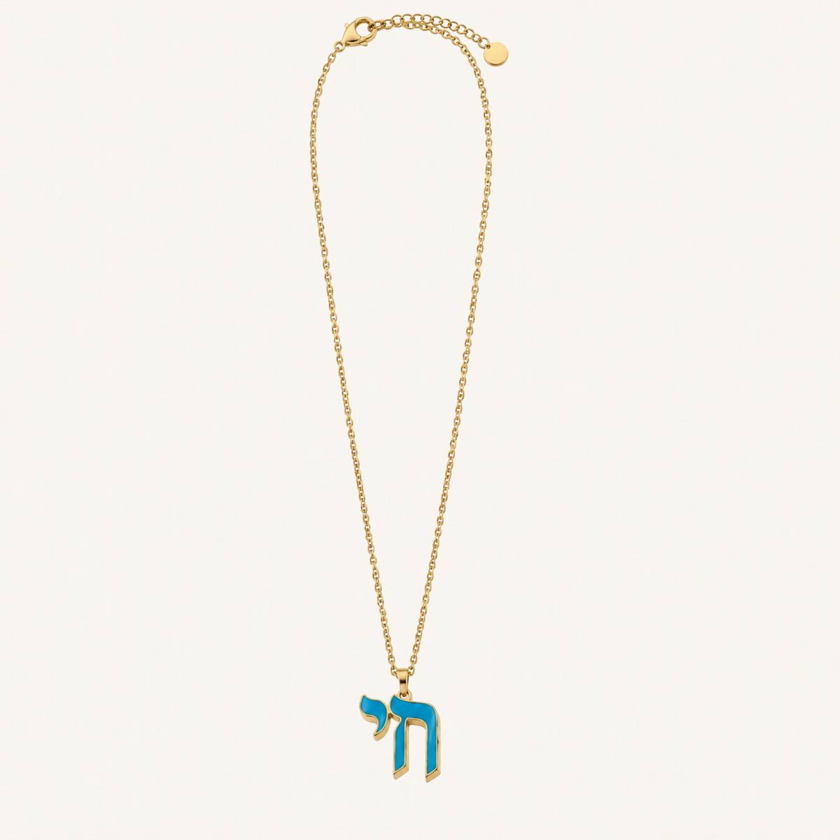 Gold-tone chain necklace with a blue Chai pendant.