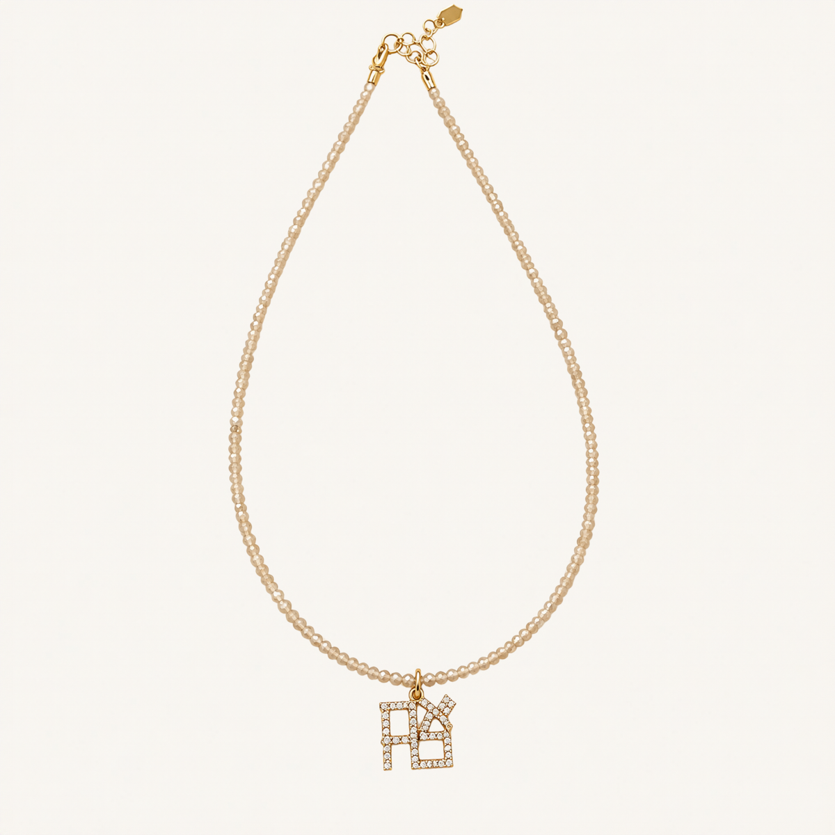 Beaded necklace with a sparkling Hebrew Ahava pendant.