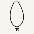 Twisted black cord necklace with a black and gold-tone Chai pendant.
