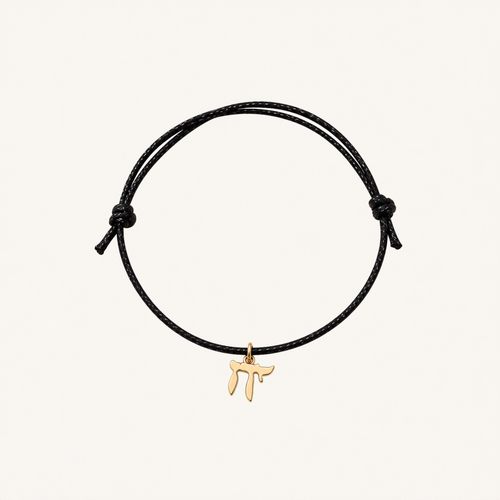 Black adjustable cord bracelet with a gold-tone Chai charm.