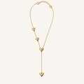 Gold-tone Y-shaped necklace with four heart accents.