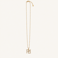 Gold-tone necklace with white bead accents and a Hebrew Ahava pendant.