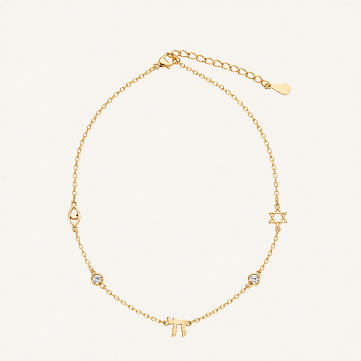 A delicate gold chain necklace featuring Hebrew letter charms, including a Pi symbol and a Star of David, with a small clear stone accent, displayed on a light cream background.