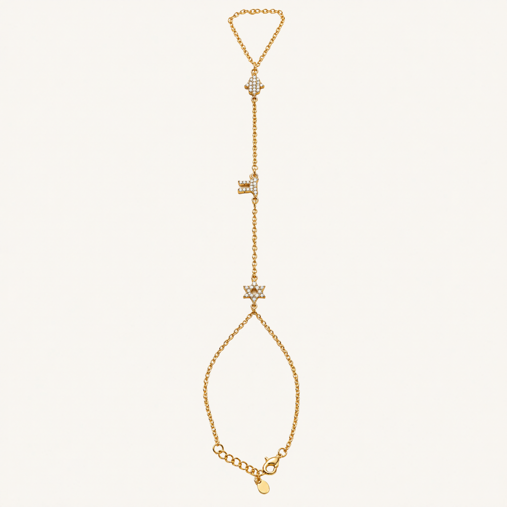 Hand chain with Hamsa, Chai and Star of David charms.
